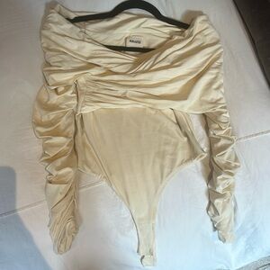 Size small khaite body suit in cream